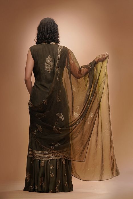 A model showcasing Metallic Print Sharara Set by Shruti S Label from Shruti S Label's collection