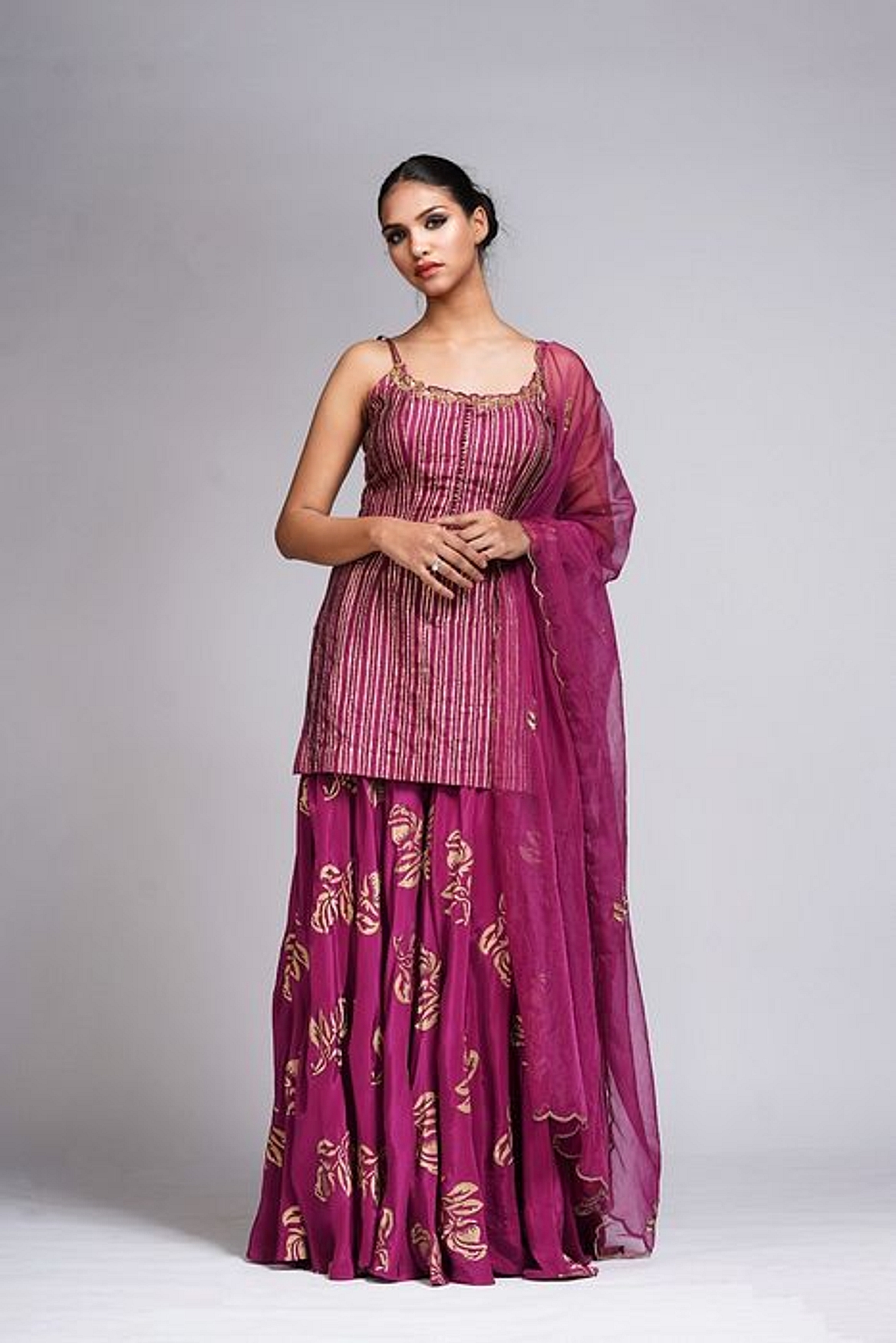 A model showcasing Hand Work Block Print Wine Sharara Suit Feature image by Shruti S Label from Shruti S Label's collection