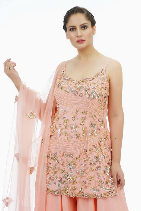 A model showcasing The Modern Sharara Suit by Shruti S Label from Shruti S Label's collection