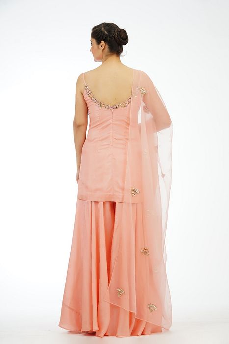 A model showcasing The Modern Sharara Suit by Shruti S Label from Shruti S Label's collection