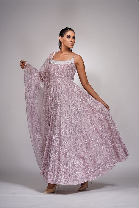 A model showcasing Lilac Anarkali With Off White Hand Paint Pearl Embroidery by Shruti S Label from Shruti S Label's collection