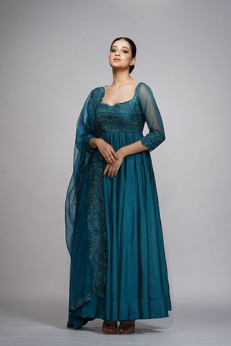 A model showcasing Classic Teal Embroidery Anarkali by Shruti S Label from Shruti S Label's collection