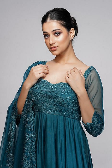 A model showcasing Classic Teal Embroidery Anarkali by Shruti S Label from Shruti S Label's collection