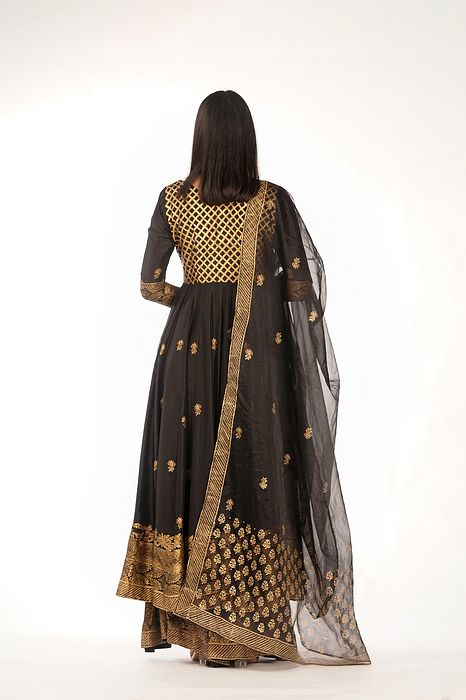A model showcasing Angrakha Anarkali Black by Shruti S Label from Shruti S Label's collection