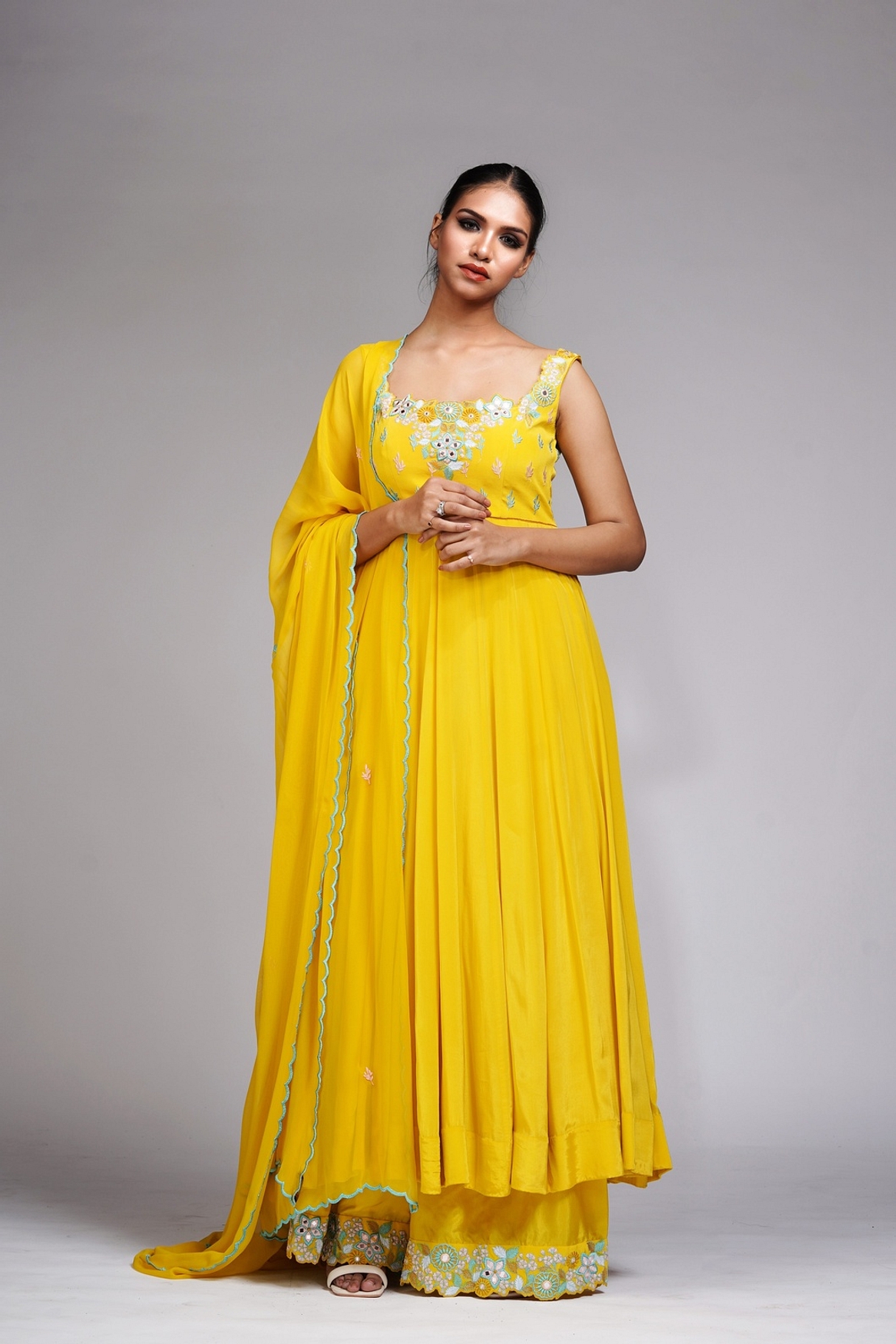 A model showcasing Thread Mirror Work Anarkali In Yellow Feature image by Shruti S Label from Shruti S Label's collection
