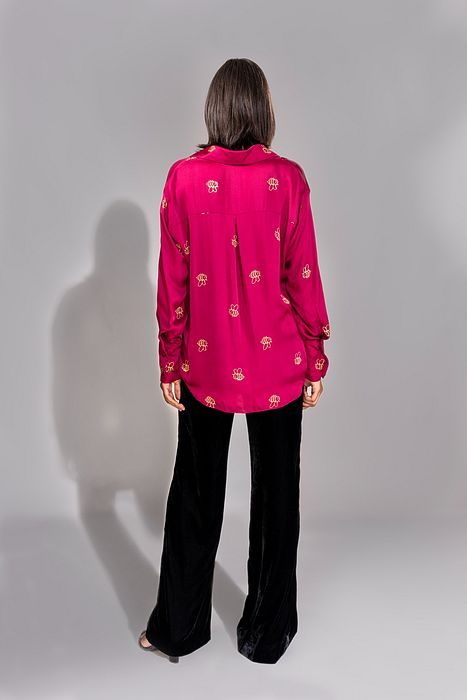 A model showcasing Dark Pink Formal Satin Shirt In Loose Fit by Shruti S Label from Shruti S Label's collection
