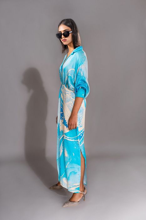 A model showcasing Blue Marble Print Satin Dress by Shruti S Label from Shruti S Label's collection