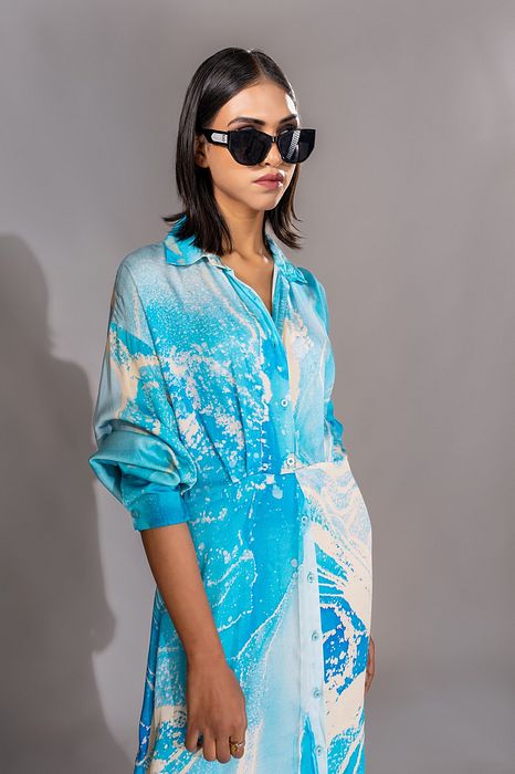 A model showcasing Blue Marble Print Satin Dress by Shruti S Label from Shruti S Label's collection