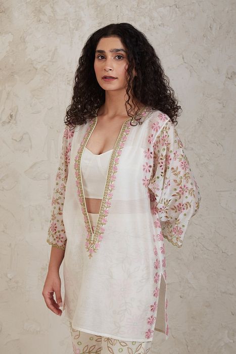 A model showcasing Amal Off White Short Kurta Set by Sue Mue from Sue Mue's collection