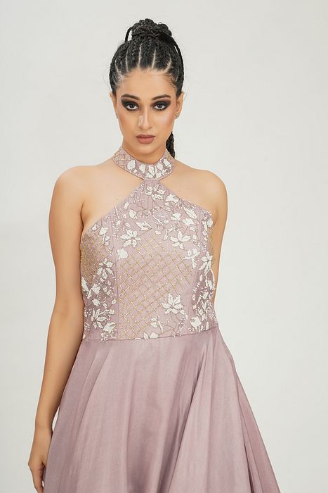 A model showcasing White Embroidery Halter Neck Gown In Lilac by Shruti S Label from Shruti S Label's collection