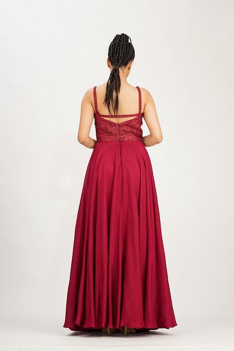 A model showcasing Red Dancing Girl Emoji Gown by Shruti S Label from Shruti S Label's collection