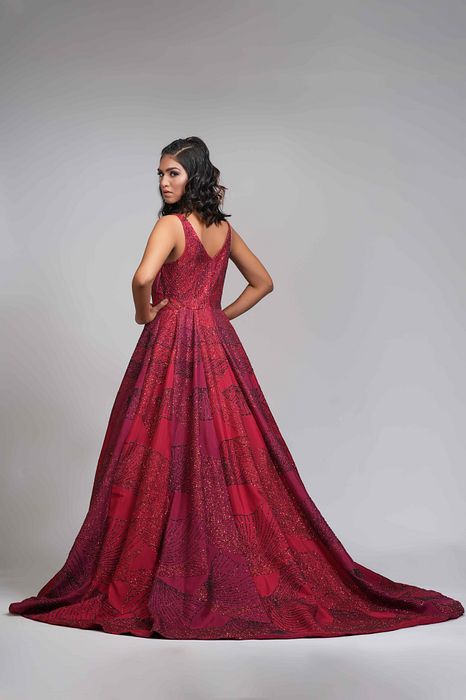 A model showcasing Red Reception Gown In Silk With Trail by Shruti S Label from Shruti S Label's collection