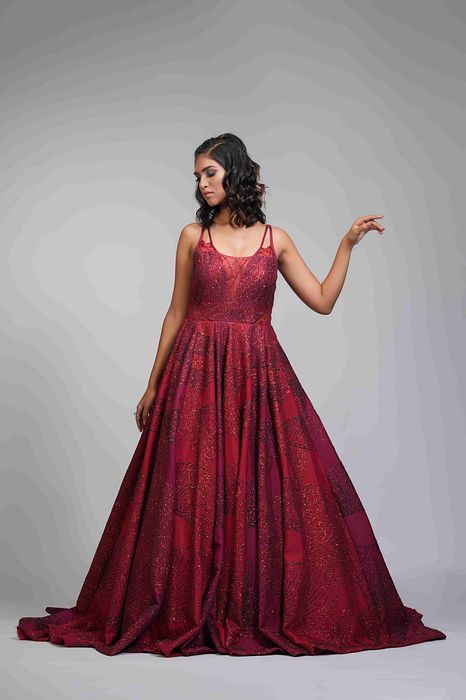 A model showcasing Red Reception Gown In Silk With Trail by Shruti S Label from Shruti S Label's collection