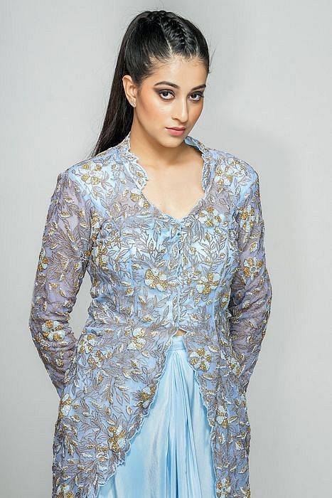 A model showcasing Sheer Power Shoulder Jacket With Dhoti Skirt by Shruti S Label from Shruti S Label's collection