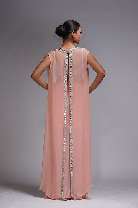 A model showcasing Peach Draped Dhoti Skirt And Cape by Shruti S Label from Shruti S Label's collection