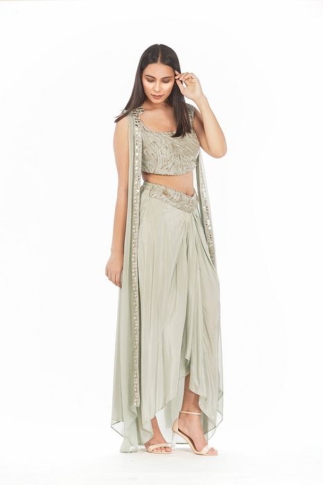 A model showcasing Sea Green Dhoti Skirt And Cape by Shruti S Label from Shruti S Label's collection