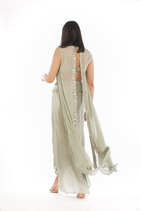A model showcasing Sea Green Dhoti Skirt And Cape by Shruti S Label from Shruti S Label's collection