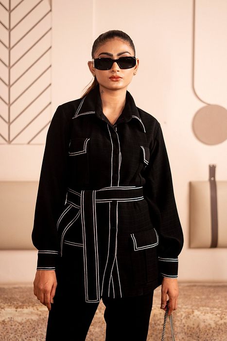 A model showcasing Monochrome Magic by Sainy Garg from Sainy Garg's collection