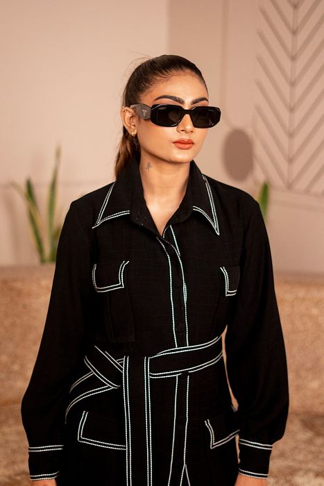 A model showcasing Monochrome Magic by Sainy Garg from Sainy Garg's collection