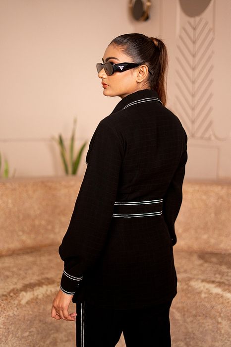 A model showcasing Monochrome Magic by Sainy Garg from Sainy Garg's collection