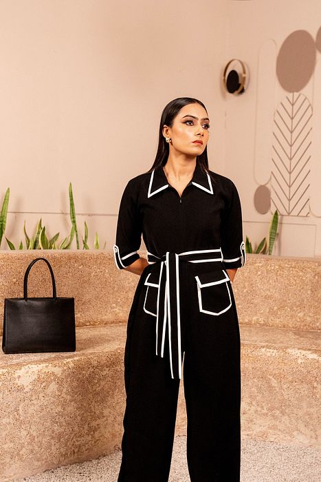 A model showcasing Ebony Elegance by Sainy Garg from Sainy Garg's collection