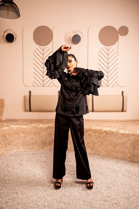 A model showcasing Sleek Obsidian by Sainy Garg from Sainy Garg's collection