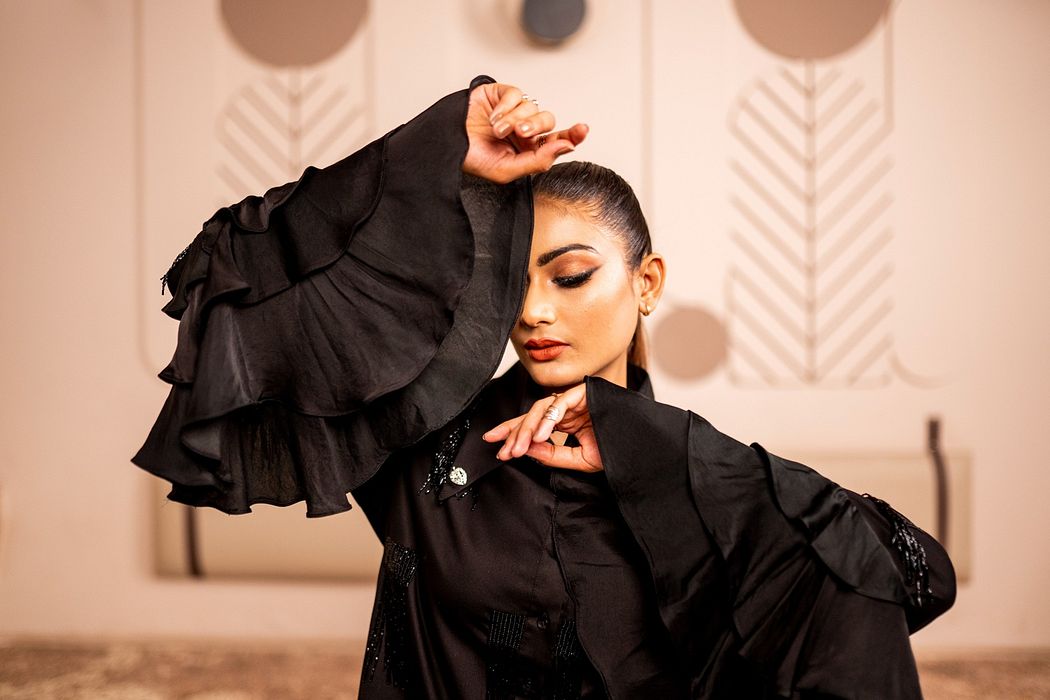 A model showcasing Sleek Obsidian by Sainy Garg from Sainy Garg's collection