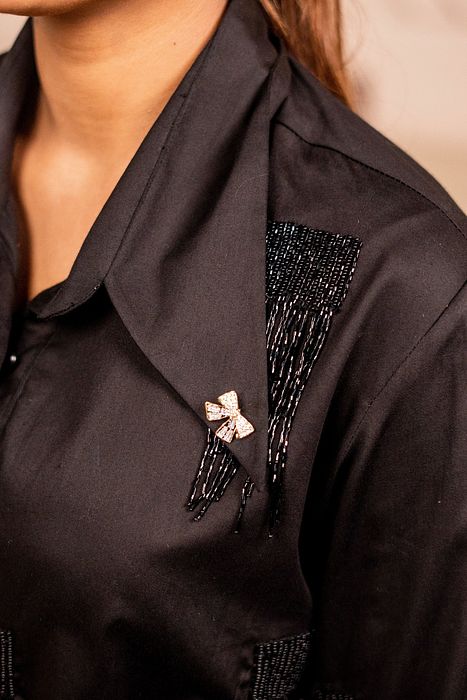 A model showcasing Sleek Obsidian by Sainy Garg from Sainy Garg's collection