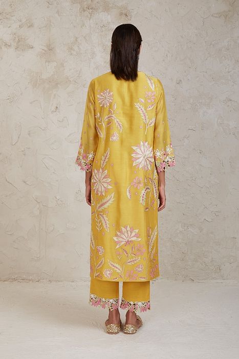 A model showcasing Daria Yellow A Line Kurta Set by Sue Mue from Sue Mue's collection