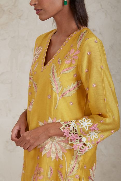 A model showcasing Daria Yellow A Line Kurta Set by Sue Mue from Sue Mue's collection