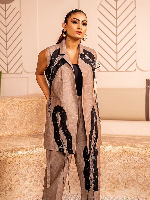 A model showcasing Cocoa Chic by Sainy Garg from Sainy Garg's collection