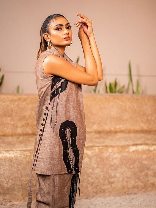 A model showcasing Cocoa Chic by Sainy Garg from Sainy Garg's collection