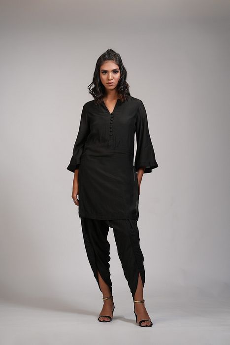A model showcasing Black Kurta Dhoti Salwaar Set by Shruti S Label from Shruti S Label's collection