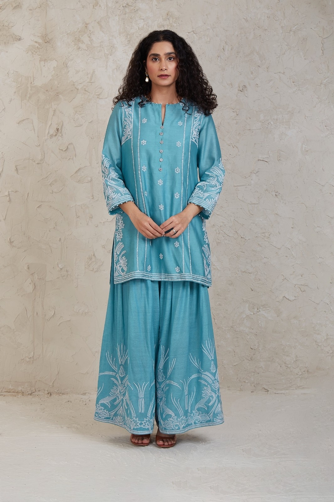 A model showcasing Fairoz Blue Short Kurta Set Feature image by Sue Mue from Sue Mue's collection