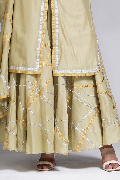 A model showcasing Abstract Gotta Work Sharara Suit by Shruti S Label from Shruti S Label's collection