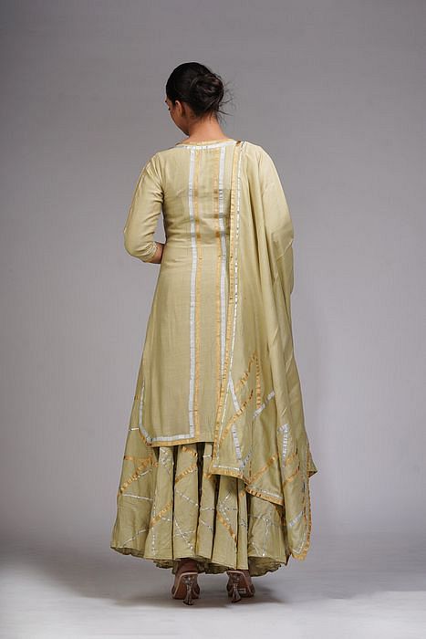 A model showcasing Abstract Gotta Work Sharara Suit by Shruti S Label from Shruti S Label's collection