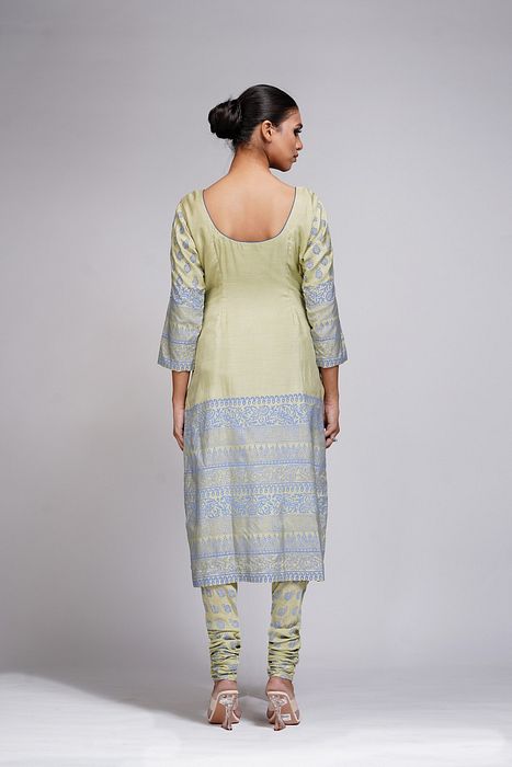 A model showcasing Hand Painted Churidaar Suit by Shruti S Label from Shruti S Label's collection