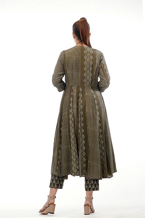 A model showcasing Hand Painted Kalidaar Suit by Shruti S Label from Shruti S Label's collection