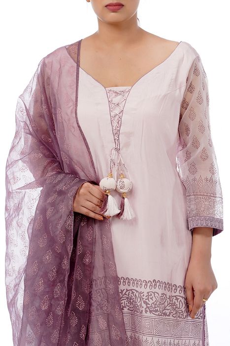 A model showcasing Churidaar Suit Printed With Hand by Shruti S Label from Shruti S Label's collection