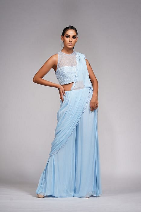 A model showcasing Ice Blue Bell Bottom Saree With Embroidery by Shruti S Label from Shruti S Label's collection