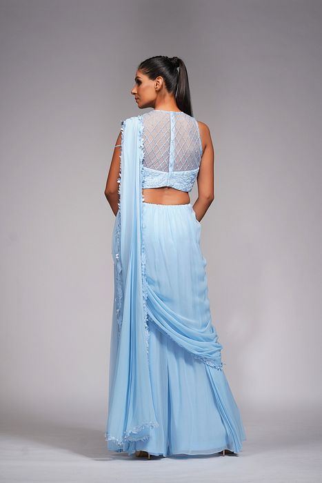 A model showcasing Ice Blue Bell Bottom Saree With Embroidery by Shruti S Label from Shruti S Label's collection