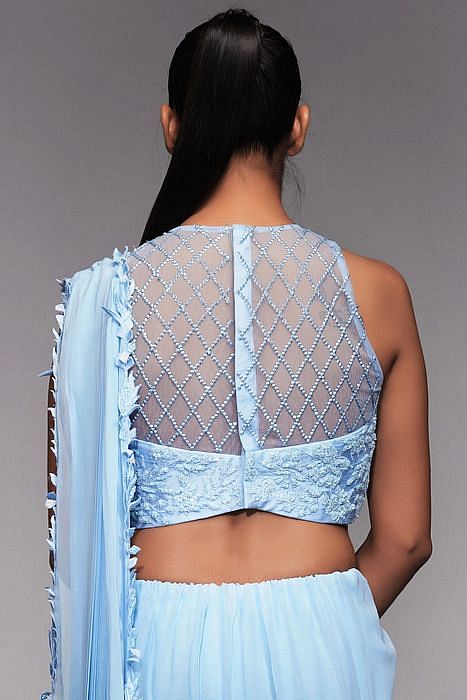 A model showcasing Ice Blue Bell Bottom Saree With Embroidery by Shruti S Label from Shruti S Label's collection