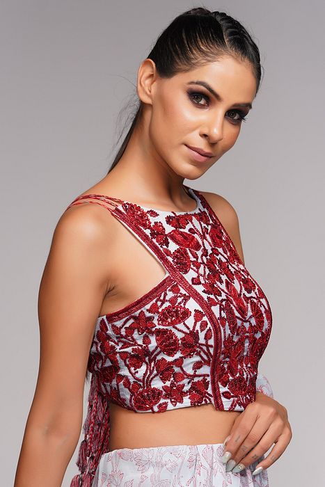 A model showcasing Red Embroidery Hand Painted Bell Bottom Saree by Shruti S Label from Shruti S Label's collection
