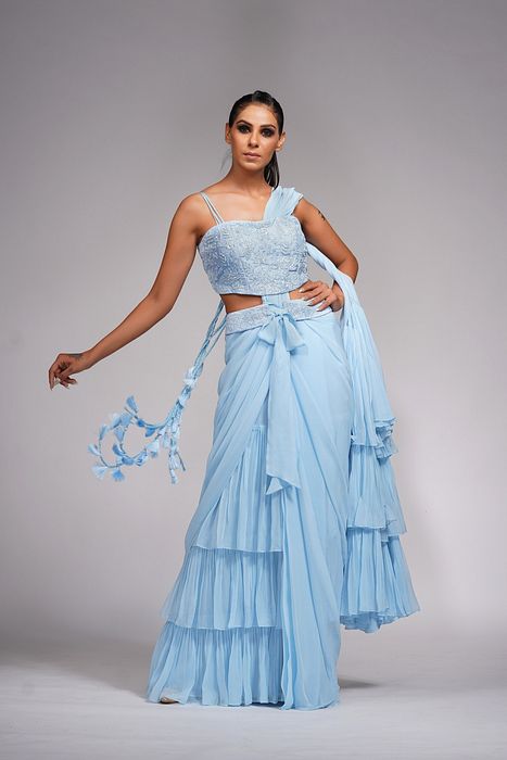 A model showcasing Ice Blue Ruffle Saree With Belt by Shruti S Label from Shruti S Label's collection