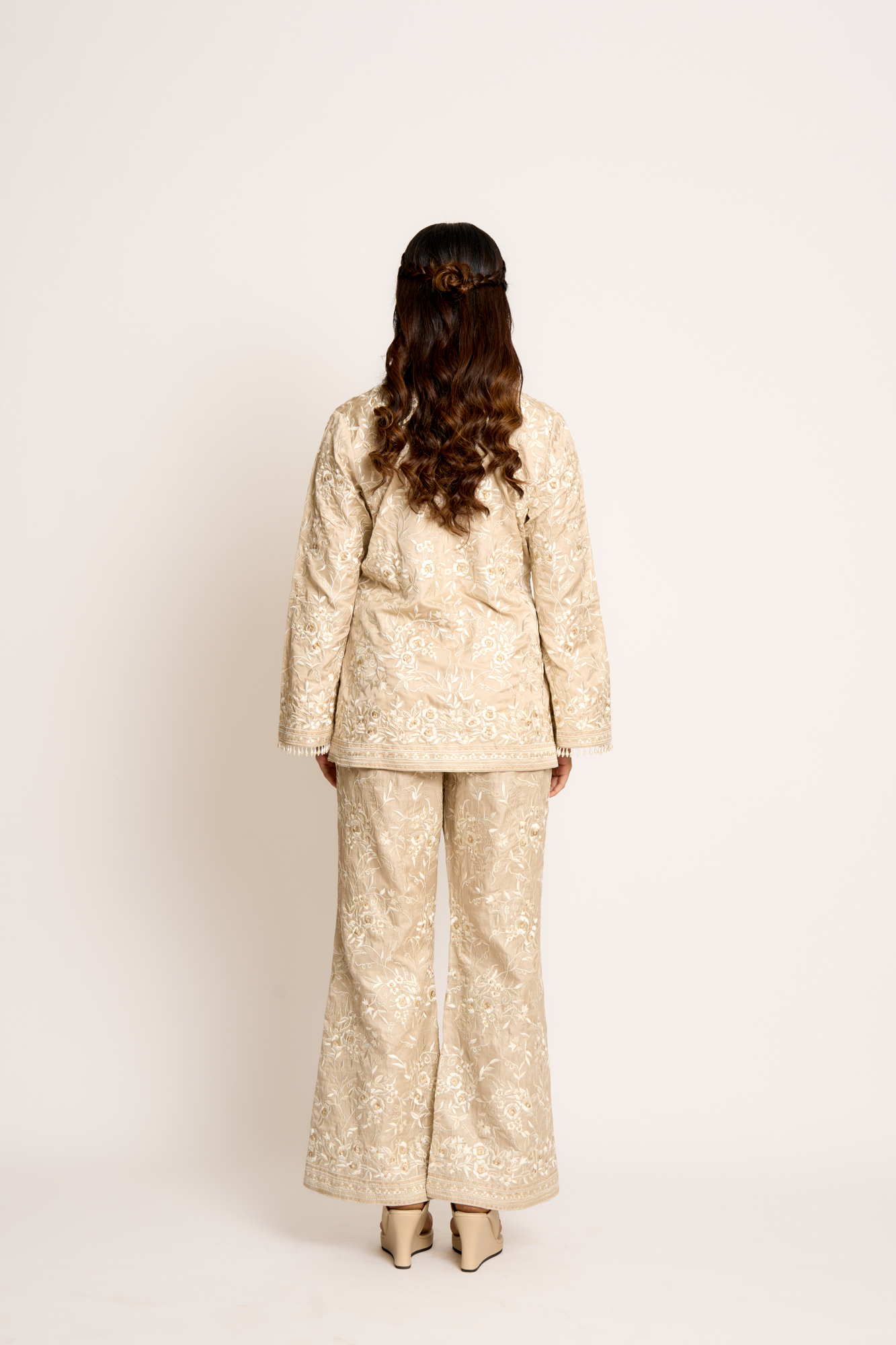 A model showcasing Antique Beige Gulnaaz Twin Set by Ashtar from Ashtar's collection