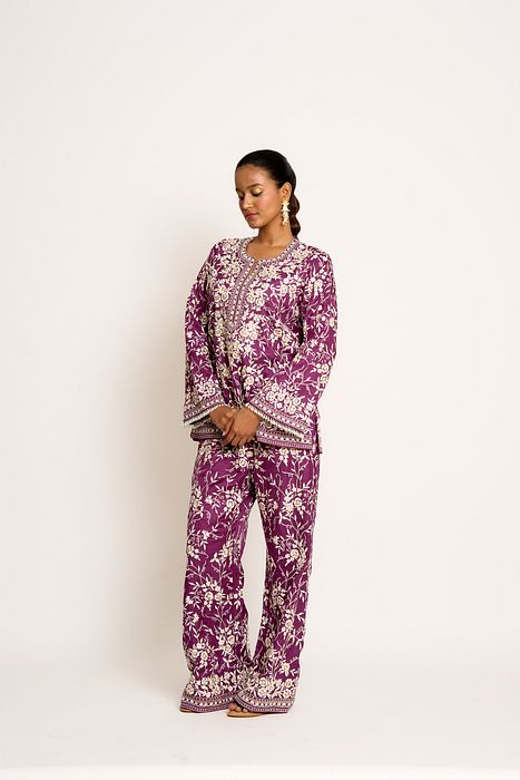 A model showcasing Lollipop Purple Gulnaaz Twin Set by Ashtar from Ashtar's collection